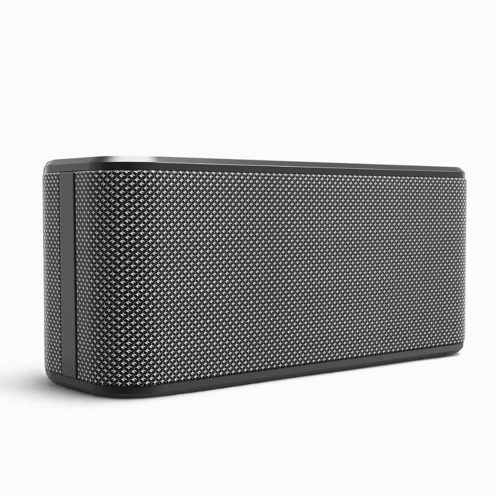 A dark gray rectangular portable speaker with rounded corners and a textured silver mesh grille on a white background